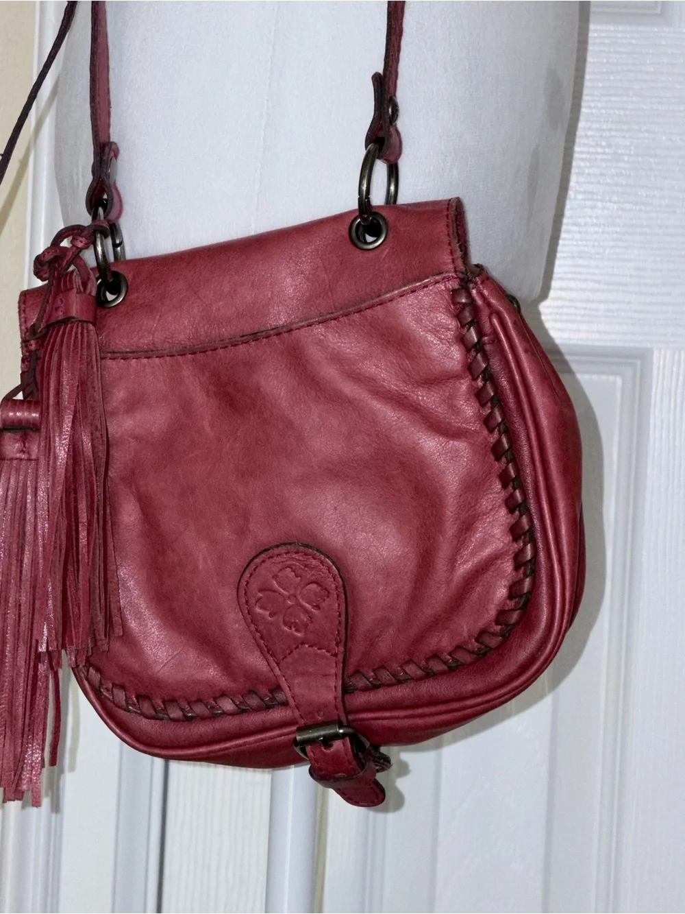 Patricia Nash Karis Leather Whipstitch Saddle Bag in a rich red/berry